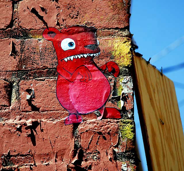 Red Critter on Brick - alley behind La Brea, south of Hollywood, between First and Second Street