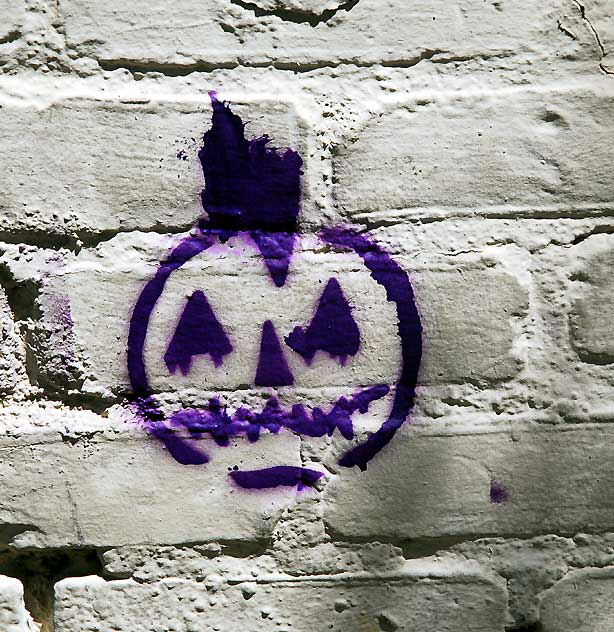 Scarecrow Stencil on White Brick