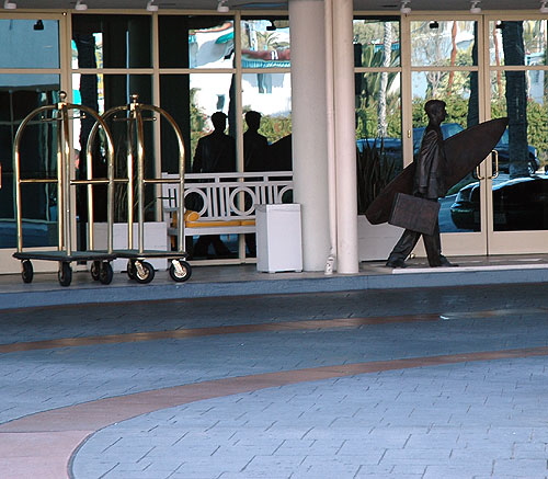 bronze surfer with the briefcase at the Lowe's hotel, across from Chez Jay, Ocean Avenue, Santa Moinca