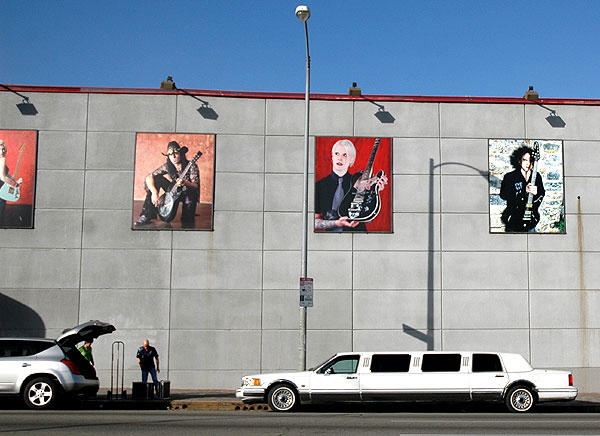 In the long winter sun, a stretch limo at the Guitar Center - Sunset Boulevard