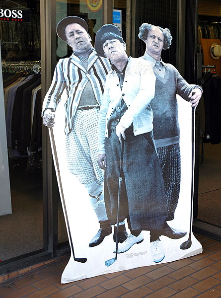 Three Stooges at golf - cutout graphic at the Hollywood Suit Outlet, Hollywood Boulevard