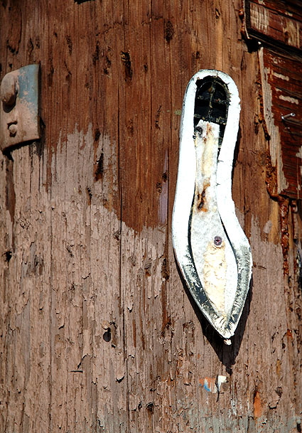 Sole of woman's shoe nailed to a telephone pole - alley off Melrose Avenue, just south of Hollywood 