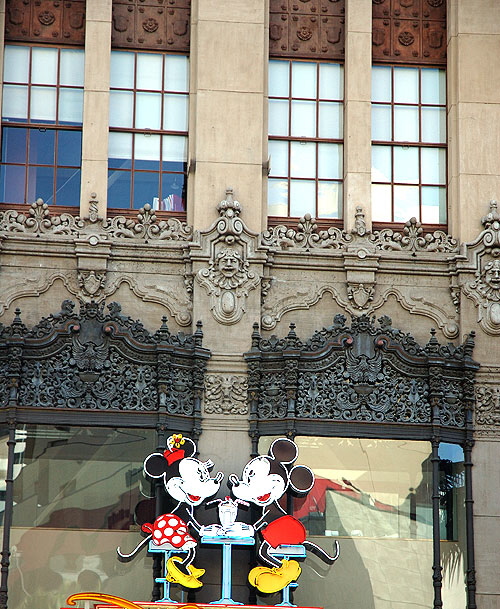 Mickey and Minnie are still on that perpetual date, on the wall of the El Capitan Theater, Hollywood Boulevard