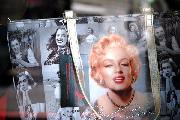 Purse for sale in a window next to the Hollywood Wax Museum