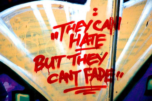 Graffiti on alley wall behind Melrose Avenue  - hate message