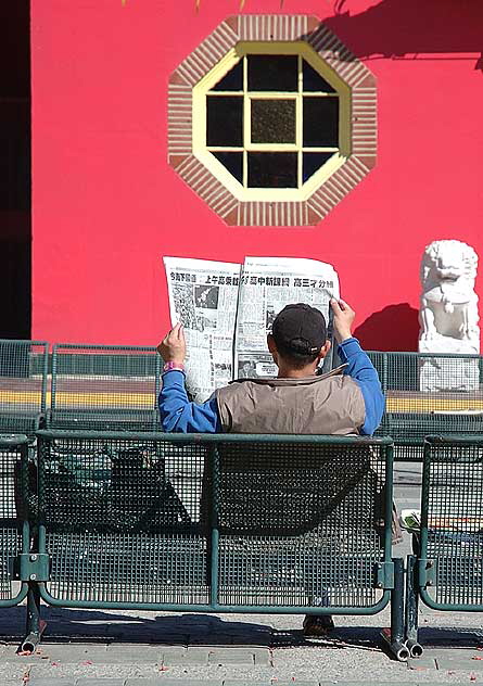 Los Angeles' Chinatown - man reading lcoal newspaper