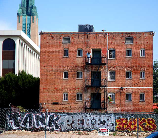 Brick apartment building, southeast corner of Vermont and Wilshire, Los Angeles