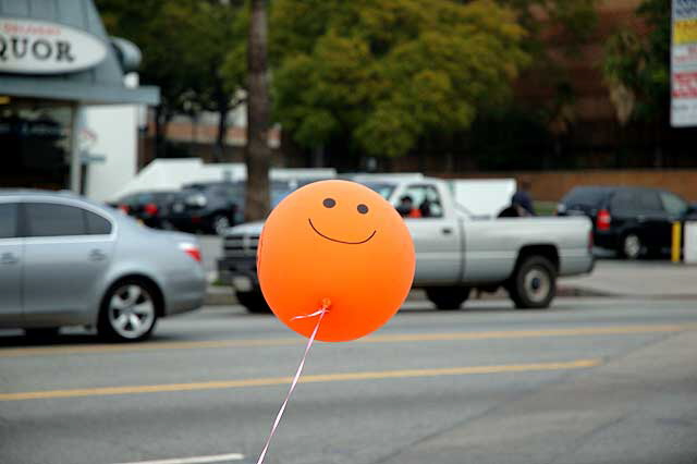 Orange "Smile" balloon at tire shop - Sunset at Fuller, Hollyw