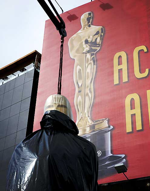 Giant Oscar figure wrapped to protect it from the rain prior to the Motion Pictures Arts and Sciences presentation of the Oscars - Hollywood and Highland at the Kodak Theater, Friday, February 22, 2008