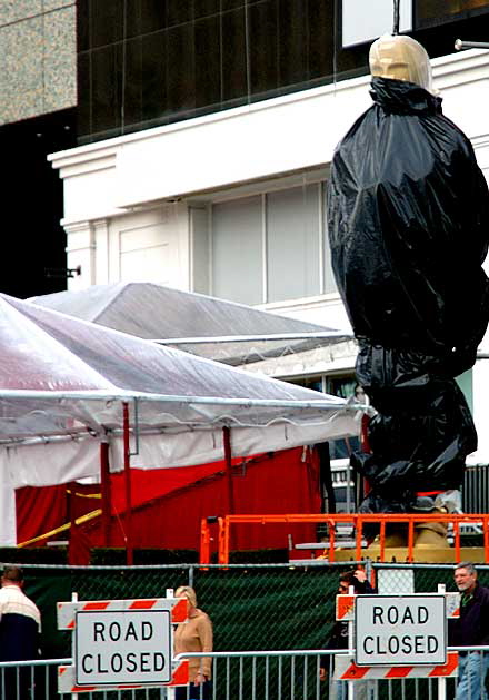 Giant Oscar figure wrapped to protect it from the rain prior to the Motion Pictures Arts and Sciences presentation of the Oscars - Hollywood and Highland at the Kodak Theater, Friday, February 22, 2008