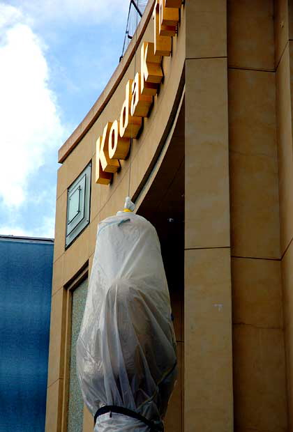 Giant Oscar figure wrapped to protect it from the rain prior to the Motion Pictures Arts and Sciences presentation of the Oscars - Hollywood and Highland at the Kodak Theater, Friday, February 22, 2008