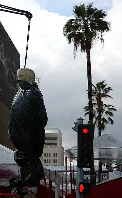 Giant Oscar figure wrapped to protect it from the rain prior to the Motion Pictures Arts and Sciences presentation of the Oscars - Hollywood and Highland at the Kodak Theater, Friday, February 22, 2008