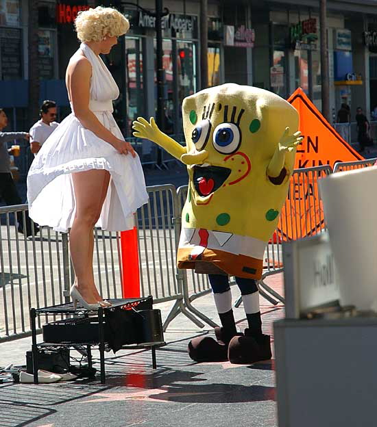 Celebrity impersonators on Hollywood Boulevard in front of the Kodak Theater - Marilyn Monroe and SpongeBob SquarePants