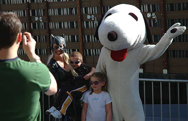 Celebrity impersonators on Hollywood Boulevard in front of the Kodak Theater - Catwoman and Snoopy