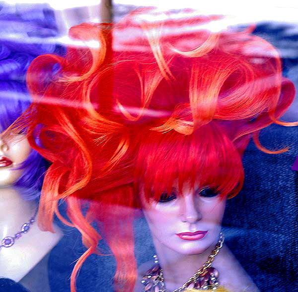 Orange wig for sale in shop window, Hollywood Boulevard