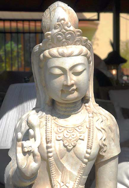 Buddha on the lot of a garden store, La Brea at Third, West Los Angeles