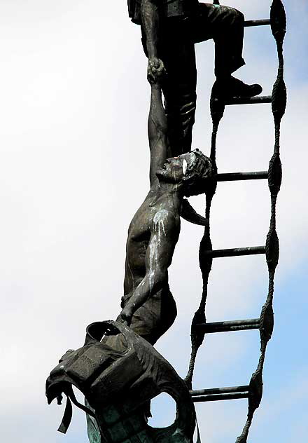 Two merchant seamen climbing a Jacob's ladder after making a rescue at sea – sculpture by Jasper D'Ambrosi – at the American Merchant Marine Veterans Memorial, South Harbor Boulevard at West 6th Street, San Pedro, California