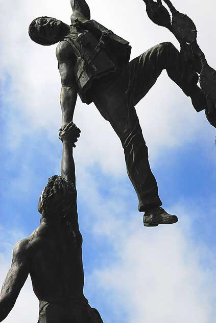 Two merchant seamen climbing a Jacob's ladder after making a rescue at sea  sculpture by Jasper D'Ambrosi  at the American Merchant Marine Veterans Memorial, South Harbor Boulevard at West 6th Street, San Pedro, California