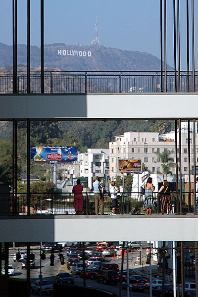 Midweek tourists at Hollywood and Highland, the Hollywood Sign to the north.