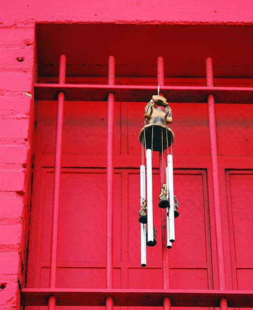 Wind chime and red wall - alley behind Hollywood Boulevard