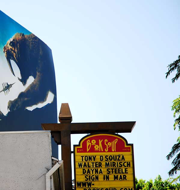 Book Soup, Sunset Boulevard, West Hollywood - under billboard for the movie "10,000 BC"