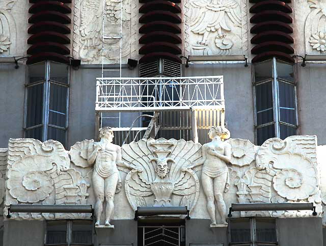 A man and woman meet on the fire escape of the local Art Deco landmark, the Sunset Tower Hotel on the Sunset Strip (8358 Sunset Boulevard)  1929, architect Leland A. Bryant. 