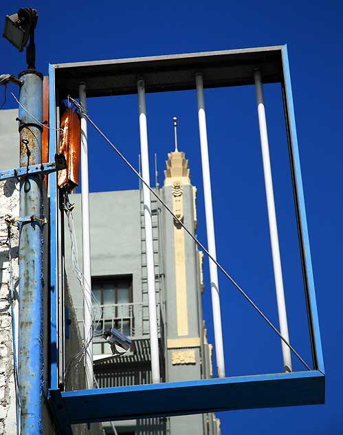 Blue framing  the Hollywood Center Building - Hollywood Boulevard at Cherokee - the first home of the Screen Actors Guild and of the Writers Guild of America - 1929, by Norton and Wallis-an example of the subset of Art Deco know as Zigzag Moderne 