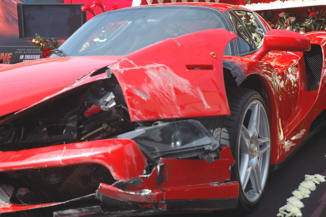 The Enzo Ferrari comedian Eddie Griffin wrecked during a recent charity race, on display outside Mann Chinese Theater, Hollywood, prior to the premier of the movie, "Redline." 