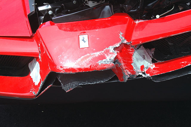 The Enzo Ferrari comedian Eddie Griffin wrecked during a recent charity race, on display outside Mann Chinese Theater, Hollywood, prior to the premier of the movie, "Redline." 