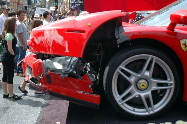 The Enzo Ferrari comedian Eddie Griffin wrecked during a recent charity race, on display outside Mann Chinese Theater, Hollywood, prior to the premier of the movie, "Redline." 