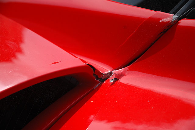 The Enzo Ferrari comedian Eddie Griffin wrecked during a recent charity race, on display outside Mann Chinese Theater, Hollywood, prior to the premier of the movie, "Redline." 