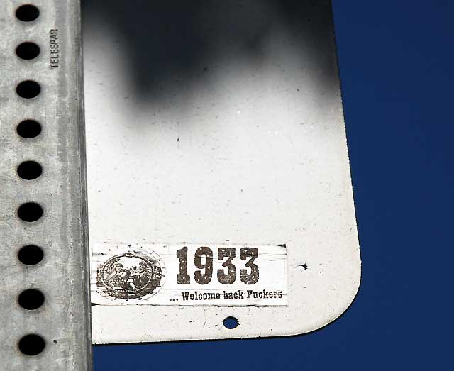 "1933" sticker on street sign, Hollywood Boulevard