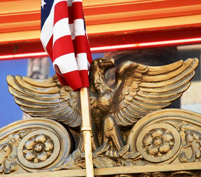 Eagle and American flags at the corner of Hollywood and Highland