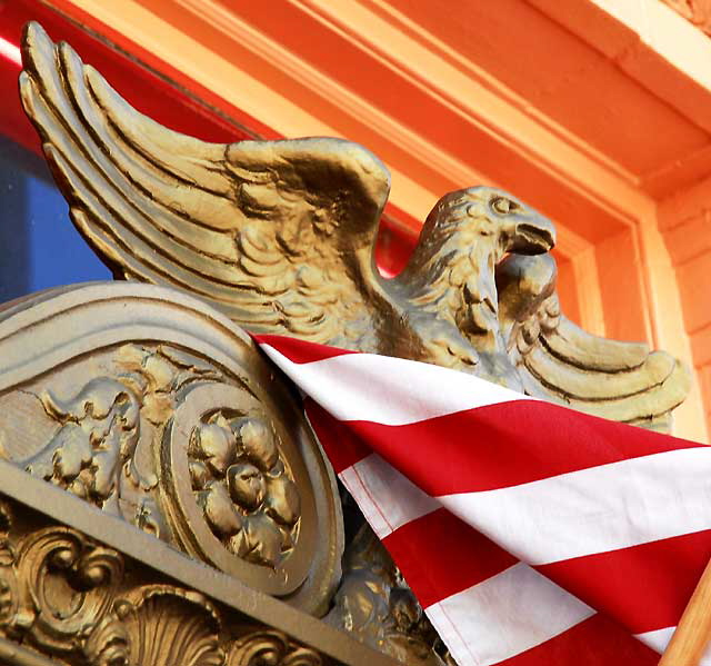 Eagle and American flags at the corner of Hollywood and Highland