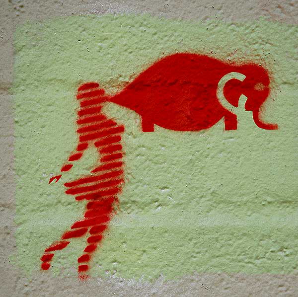 Stencil on concrete block wall, alley on east side of El Capitan Theater, Hollywood 