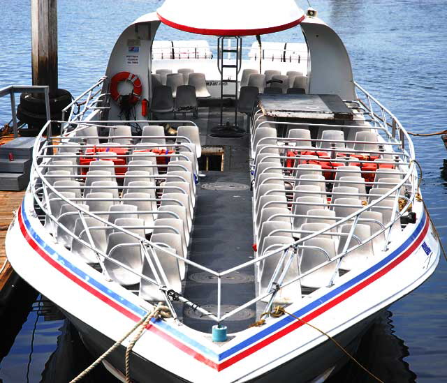 The boat slips at the Redondo Beach Pier - regimented tour boat