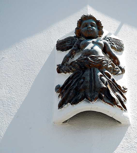 Angel on storefront, North La Brea Avenue