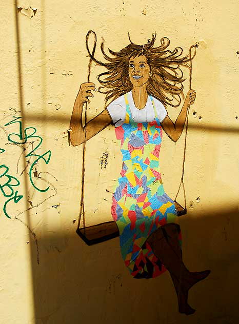 Woman on Swing - hidden mural, North La Brea Avenue at Clinton