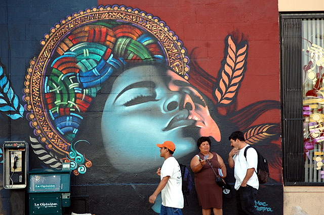 Late afternoon, Western Avenue at Hollywood Boulevard - the dreams of the other Los Angeles - mural with  pedestrians