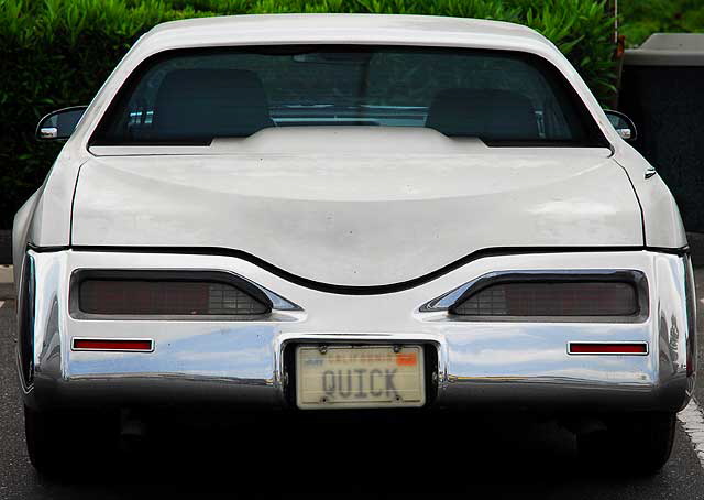 "Quick" license plate on custom car