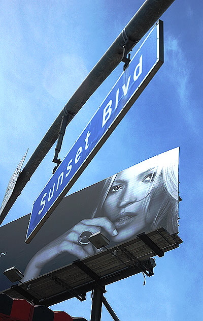 A study in blue - a face floating above the Whisky a Go Go on the Sunset Strip.  