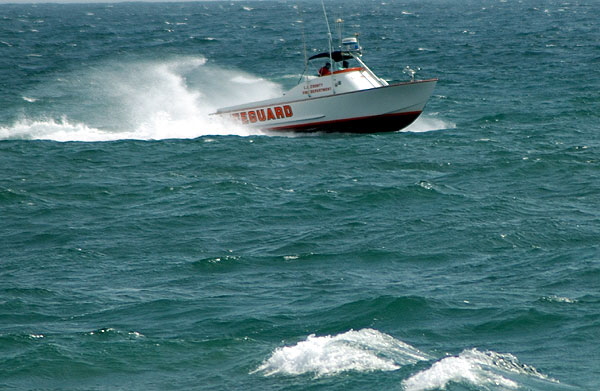 Los Angeles County Fire Department lifeguard boat blasting through the chop off Santa Monica 