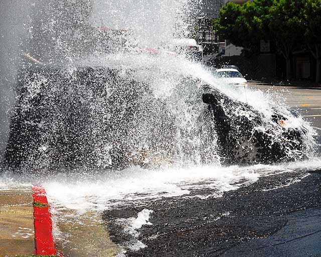 Broken fire hydrant, Tuesday, May 13, 2008, in the Wilshire District at noon - the northwest corner of Third and Vermont