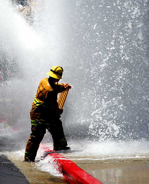 Broken fire hydrant, Tuesday, May 13, 2008, in the Wilshire District at noon - the northwest corner of Third and Vermont