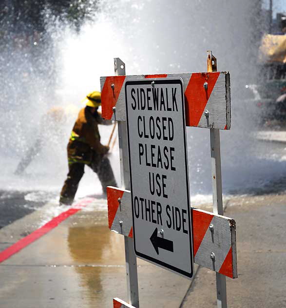 Broken fire hydrant, Tuesday, May 13, 2008, in the Wilshire District at noon - the northwest corner of Third and Vermont