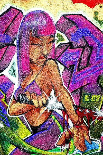 Woman piercing arm, alley graffiti, Melrose Avenue 