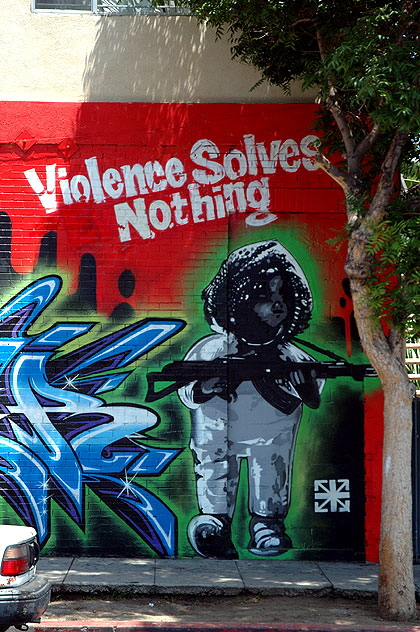 "Violence Solves Nothing" graphic - east Hollywood Boulevard, near Western Avenue 