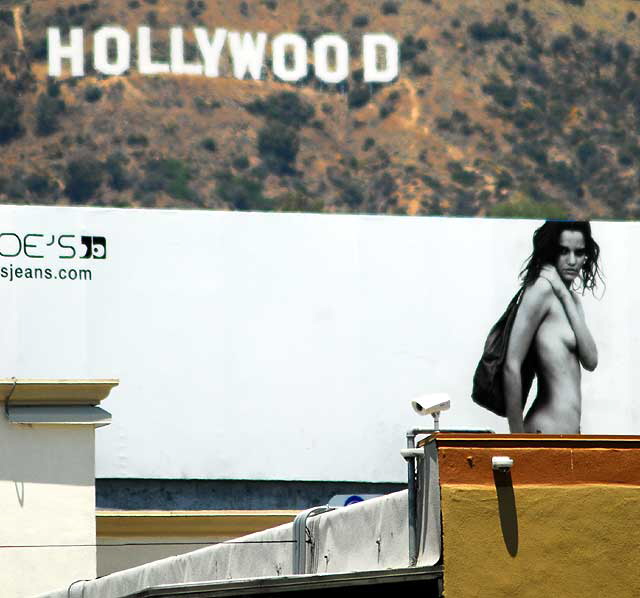 Nude on billboard, Hollywood Sign in distance