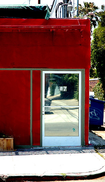 Lucky Seven  off Melrose Avenue, with a very red wall 
