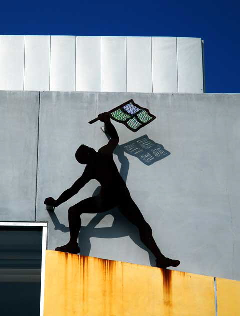 Figure on wall of fitness center, Culver City 